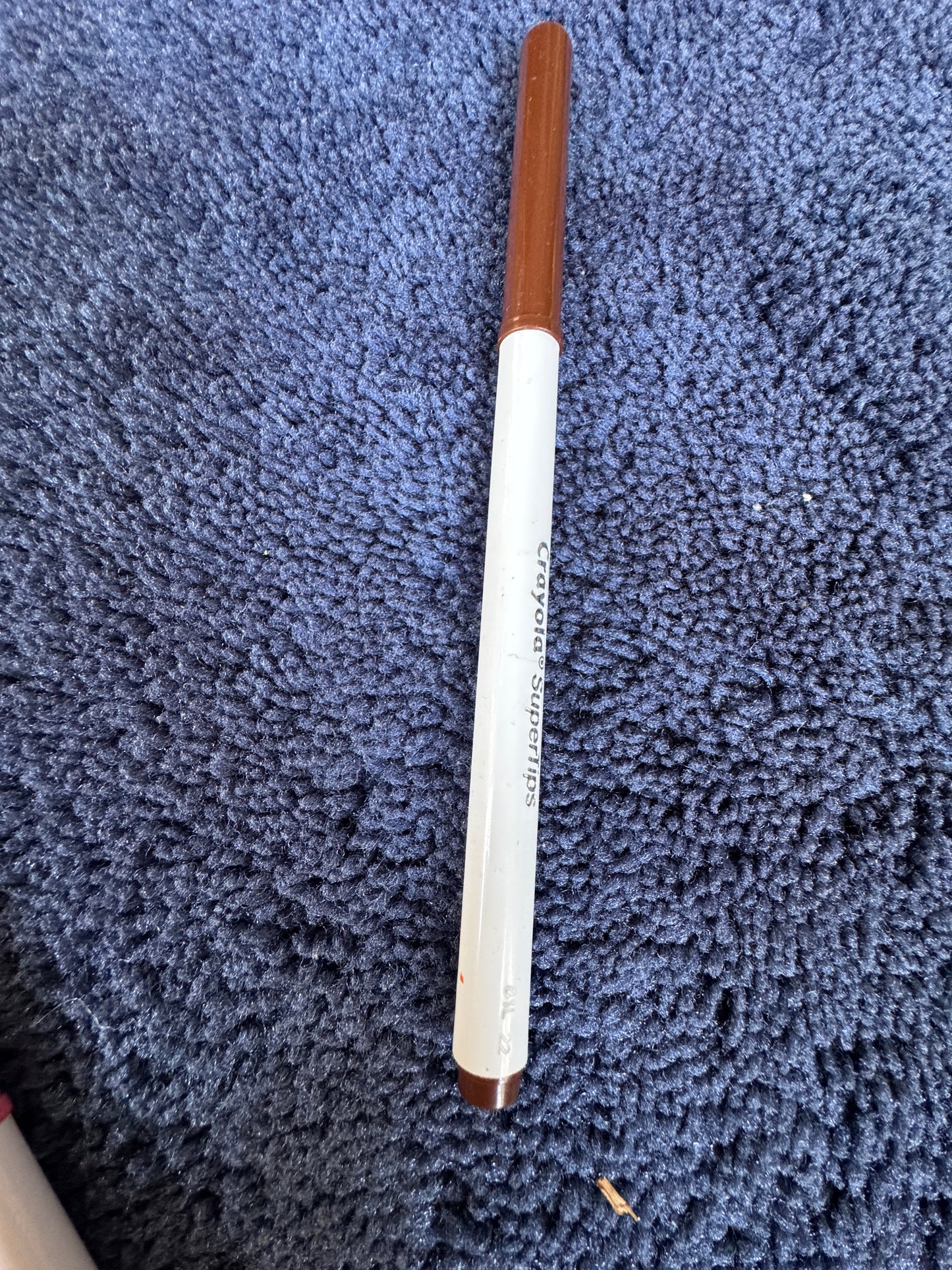 Light brown Crayola marker.