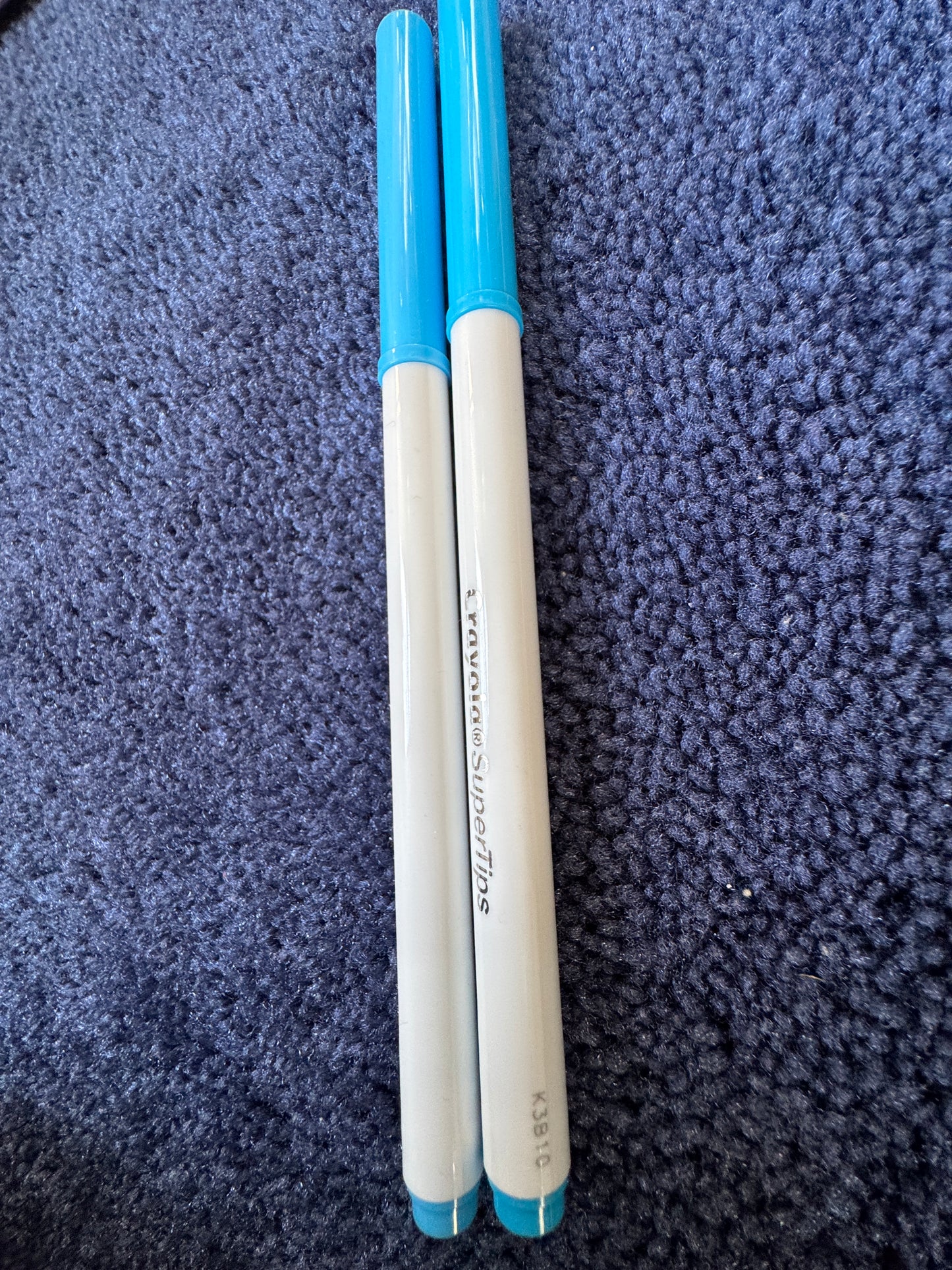 Swimming pool blue Crayola marker.